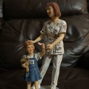 White Caps of Caring nurse with little girl